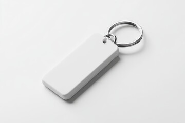 White keyring with rectangular blank tag isolated on white background, ideal for labeling or customization
