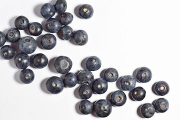 Zenith view, blueberries, with a contribution of beneficial nutrients for our body, white background.