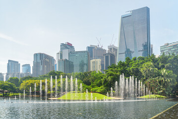 Scenic fountains in a green urban park of Kuala Lumpur