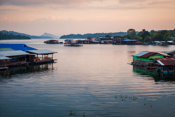 Fototapeta premium Sangkhlaburi mon village floating house at sunset Thailand 