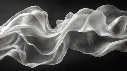 Fototapeta premium White Sheer Fabric Draped Elegantly Against Black Background