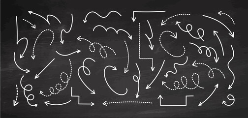 Hand-drawn chalkboard arrows and curved lines on black background © Mariia Mazaeva