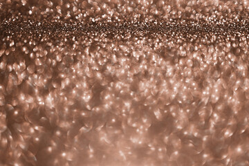Mocha Mousse, brown sparkling glitter bokeh background, abstract defocused texture. Holiday lights