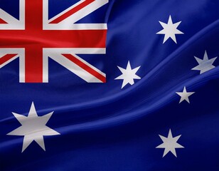 Australia flag waving at cloudy sky background. the Commonwealth of Australia flag