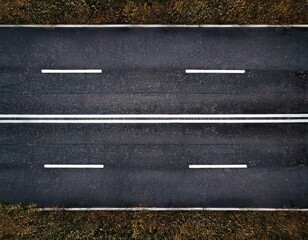 Fototapeta premium Serene Asphalt Road at Sunrise
