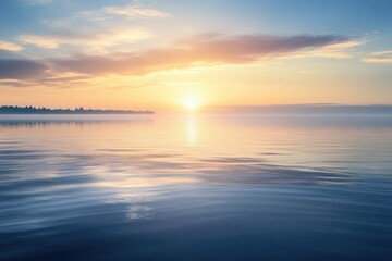 Serene sunset over calm water reveals a peaceful lakeside view at twilight