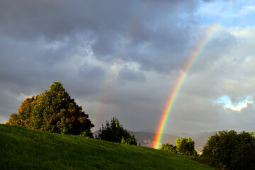 Rainbow on a stormy day in Bilbao.
