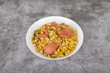 Fried corn kernels with ham sausage