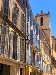 windows with shutters in the old town in Provence