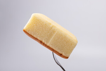 Dessert cake on a fork