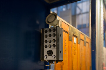 Control panel with numeric keypad in a modern industrial setting