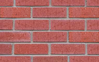 Obraz premium A red brick wall closeup background