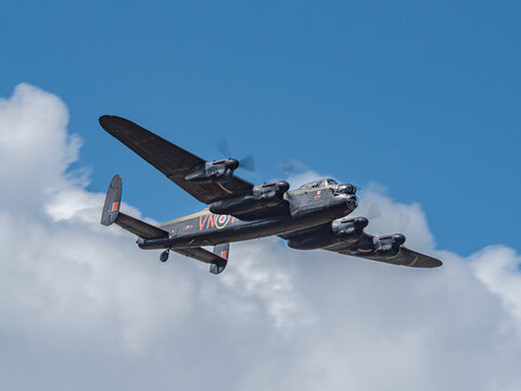 Old Buckenham, UK, July 29 2023: Avro Lancaster vintage wwII bomber aircraft flying at the airshow