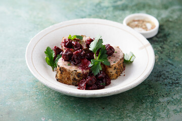 Roasted pork with cherry sauce