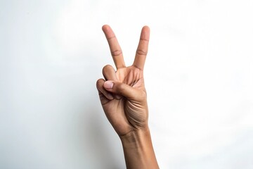 Hand gesture peace sign on white background