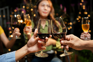 food and drink male friends are happy drinking beer and clinking glasses at a bar or pub.