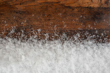 Real snow border on wet wood texture, minimal backdrop banner