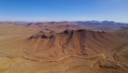 Fototapeta premium Aerial View of Majestic Mountains in a Desert Landscape