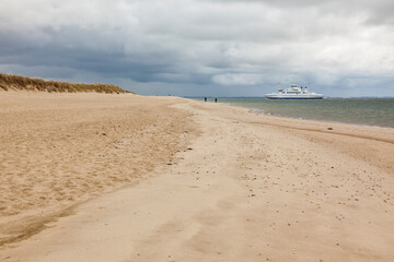 Ellenbogen beach at Sylt, ferry to Rome passing by