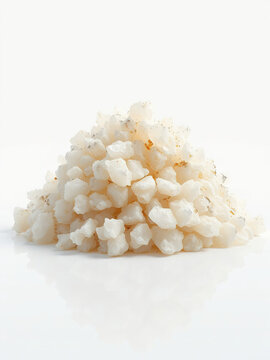 Pile of white dammar resin from Vateria indica tree on white background,  tropical resin, dammar resin,  tree resin,  natural resin,  botanical resin