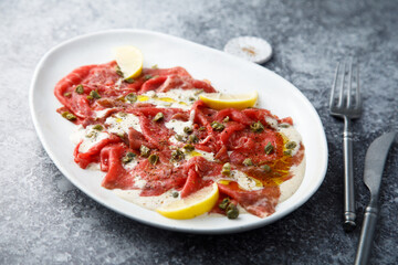 Beef carpaccio with tuna sauce
