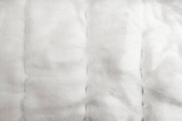 Fluffy medical cotton portioned, abstract texture ,flat lay close up