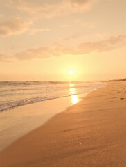 Fototapeta premium Warm sunlight casts a golden glow on the sandy beach, sand, sun, tropical
