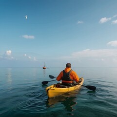 A fisherman kayaking in calm ocean waters with fishing rods and gear