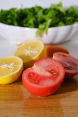 tomato and cucumber on cutting board