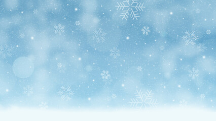 Winter snowflakes background with falling snowflakes on a blue sky for creating christmas card, invitation, or social media post.