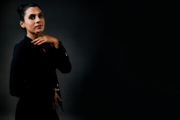 Solo Image of a Stunning Tall Female Model in a Black Suit