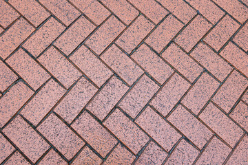 Herringbone paving block pattern closeup