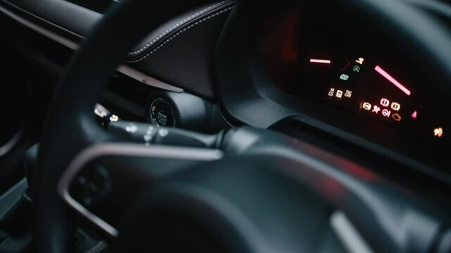 A woman starting the car with a button. Modern technology, comfort, and innovation in vehicles, providing ease of use and control.