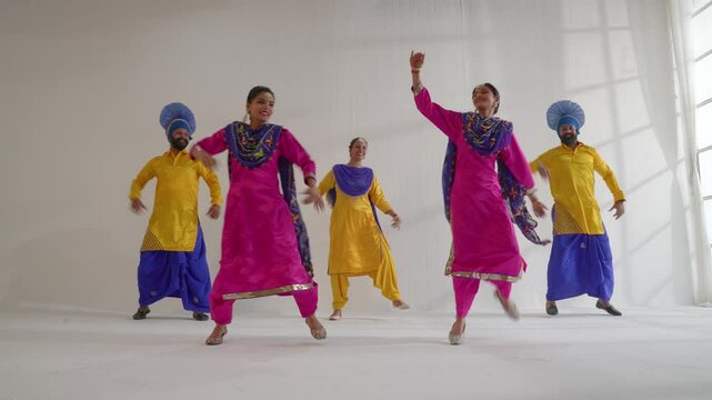 Sikh People performing bhangra during Baisakhi celebration