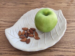 Fresh fruits and almonds on the table