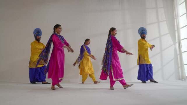 Sikh People performing bhangra during Baisakhi celebration