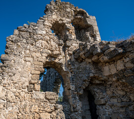 The remains of an old fortress wall against the sky.