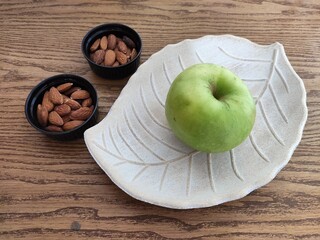 Fresh fruits and almonds on the table
