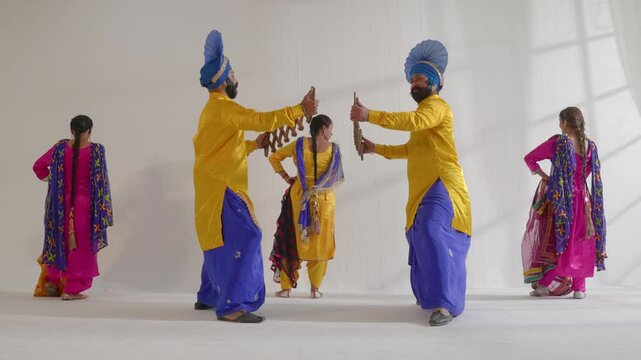 Sikh People performing bhangra during Baisakhi celebration