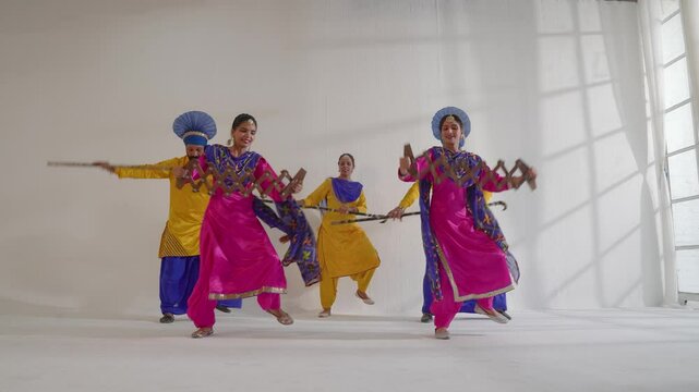 Sikh People performing bhangra during Baisakhi celebration