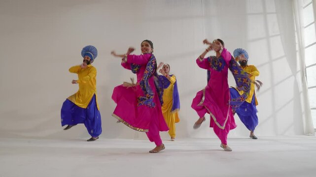 Sikh People performing bhangra during Baisakhi celebration