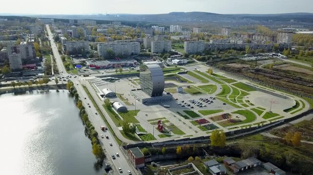 An impressive aerial view showcasing the vast urban development situated beside a water body. Stock Clip