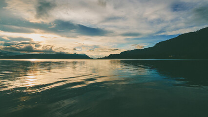 Beautiful sunset on the tropical island of Danau Toba