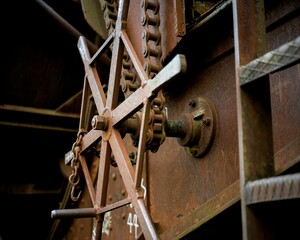 Close-up of a Rusty Industrial Gear Mechanism.