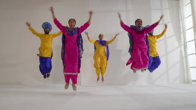 Sikh People performing bhangra during Baisakhi celebration