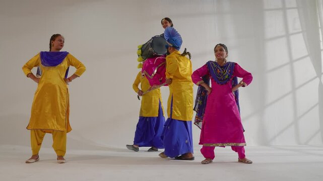 Sikh People performing bhangra during Baisakhi celebration
