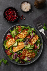 fried halloumi cheese, cucumber and tomato  salad