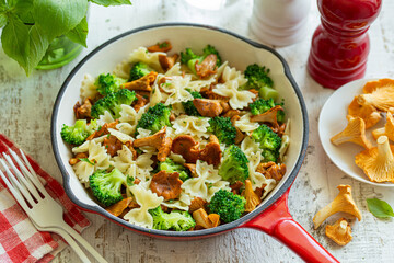 delicious vegan farfalle pasta with chanterelle mushrooms