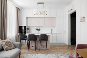 A Contemporary Modern Kitchen Design Featuring an Island and Elegant Ambient Lighting Choices
