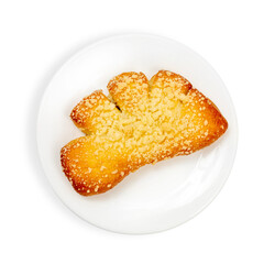 Bun with sprinkles, on a plate, top view, on a white background, isolated.